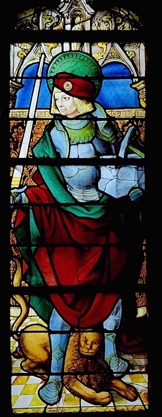 [6] Saint Adrien (identifié par le couperet et l'enclume qu'il porte au bras gauche, ainsi que par son armure et son épée)