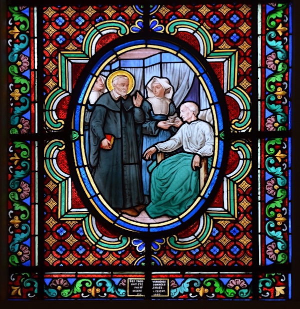 Saint Vincent de Paul auprès d'un homme malade