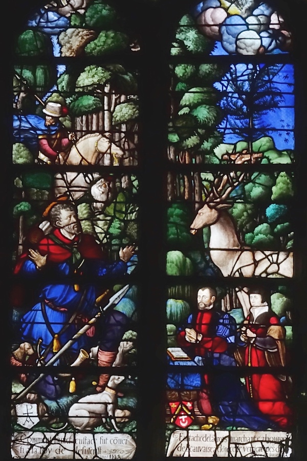 [3] Vision de saint Eustache. Le drapier Eustache Croix et son épouse Françoise de Nully furent les donateurs de cette fenêtre. On peut les voir agenouillés devant le saint qui lève les bras en extase